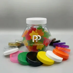 جار پلاستیکی پت 700 سی سی مدل کندو (شش ضلعی) حاوی عسل طبیعی، با درب پ پ درب تزریقی درب فلزی